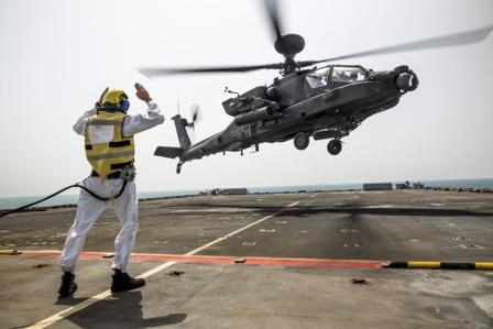 An AH-64 Apache flown by pilots from 3rd Battalion, 159th Attack ...