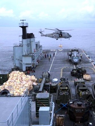 Op Herring 2014 food being taken ashore
